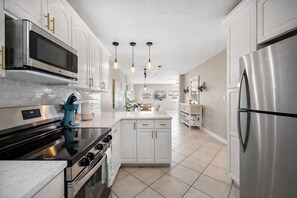 Fridge, microwave, oven, stovetop - Gorgeous Waterfront 2BR Condo w Pool and Boat Dock in Treasure Island Beach (Treasure Island)