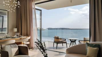 Superior Quadruple Room, Ocean View | Living area