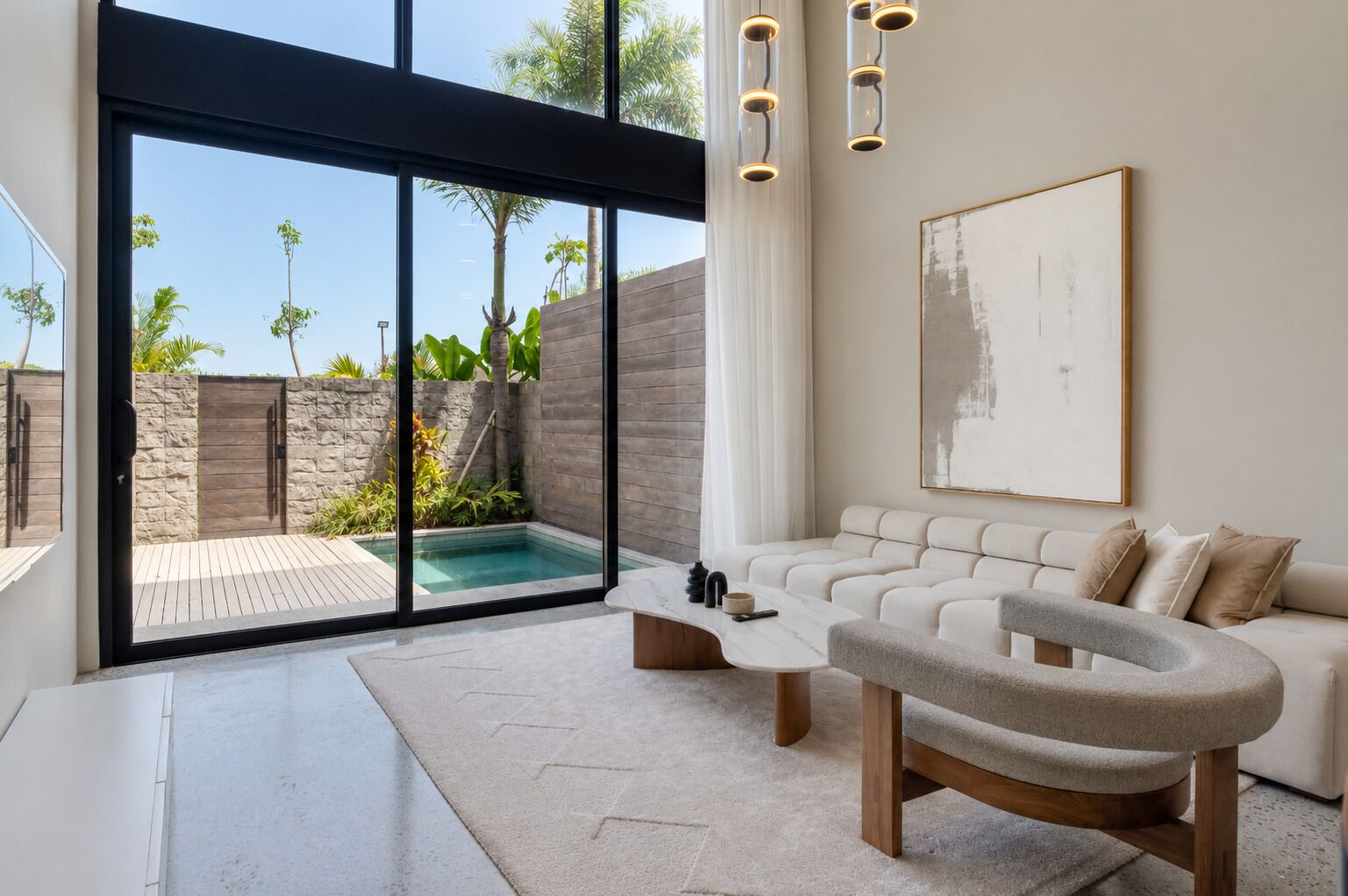 A modern living room with a pool, a sofa, and a coffee table.
