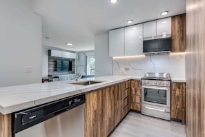 Fridge, microwave, oven, stovetop - Prime Downtown West End | Quiet 2BR Retreat (Vancouver)
