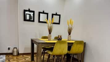 Deluxe Apartment, Balcony, City View | Dining