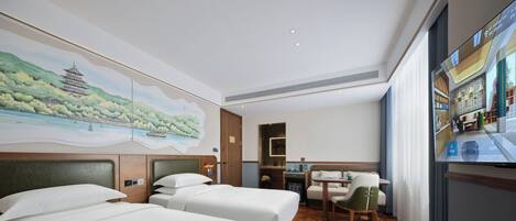 A hotel room with two beds, a desk, a chair, and a large window.