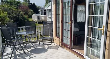 2-bed modern caravan with patio doors onto full veranda