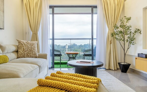 TV - Skypiea Loft - Modern 1BR near Junction Mall with WiFi, Pool, Gym & Backup Power (Nairobi)