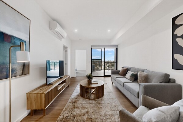 Living area - Stylish New Apartment with Modern Appliances (Cannington)