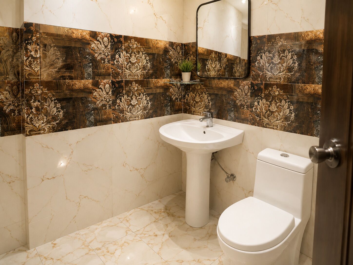A bathroom with a marble sink, toilet, and decorative tiles.