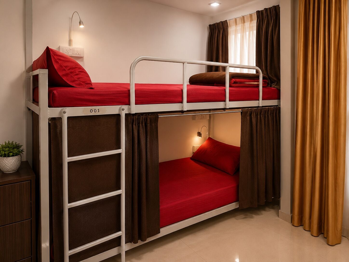 A bunk bed room with a desk, a lamp, and a potted plant.