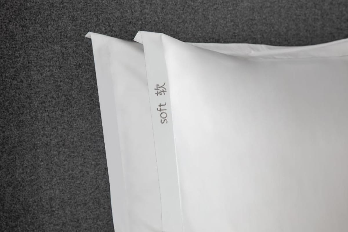 A white envelope with the text 'soft' visible on it.