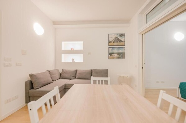Standard Apartment, Courtyard View | Living area | Flat-screen TV