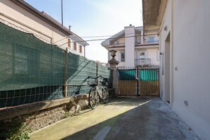 Apartamento superior, vista para o pátio | Jardim