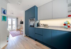 Fridge, microwave, oven, stovetop - Light‑Filled Coastal Townhouse with Sweeping Sea Views (Swanage)
