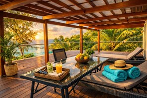 Outdoor dining - Seafront 1 bedroom large penthouse apartment in stunning Pointe Aux Biches. (Trou-Aux Biches)