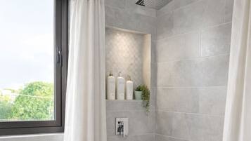 Douche, sĂšche-cheveux, serviettes fournies, savon