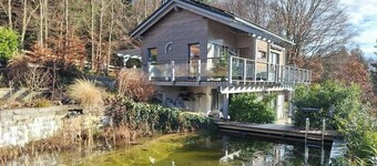 Noble chalet with natural swimming pond and sauna