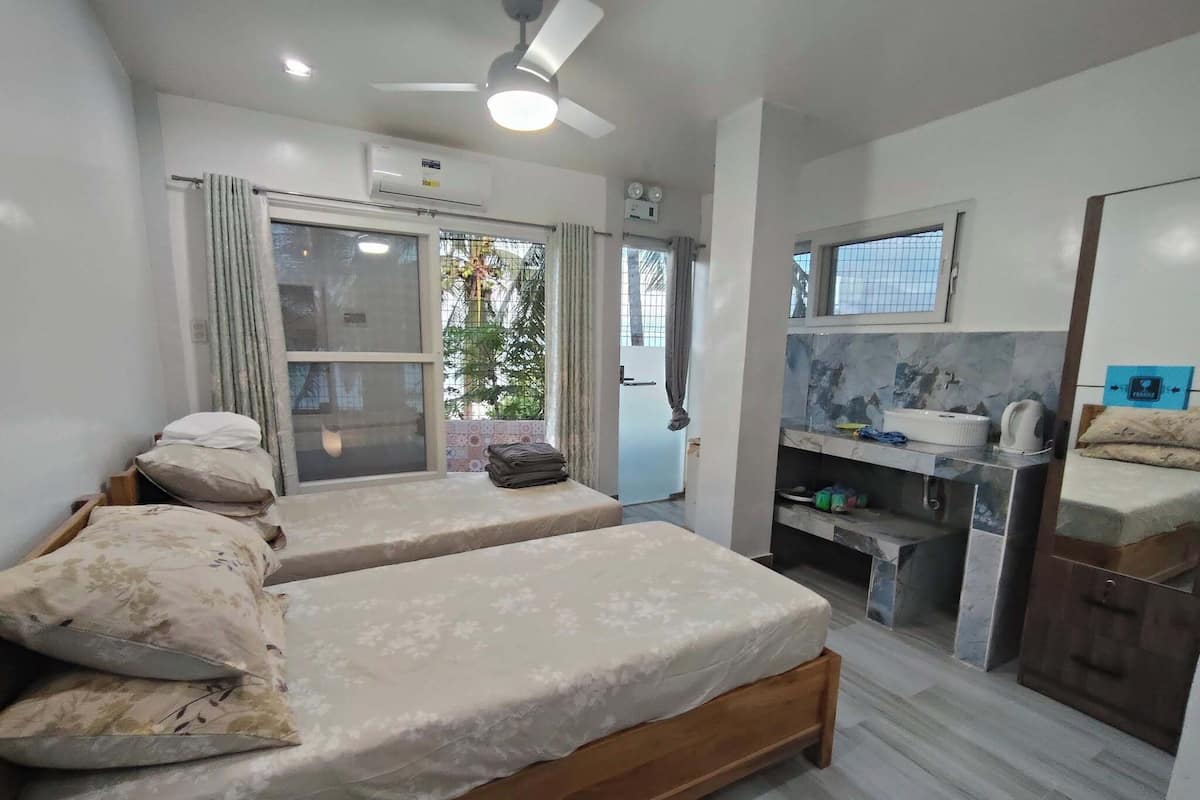 Habitación con 2 camas individuales