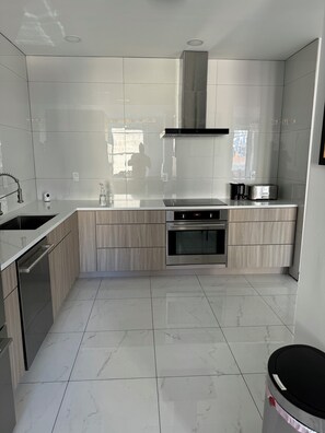 Private kitchen - Fabulous, modern condo in the heart of Louisville with fantastic city view! (Louisville)