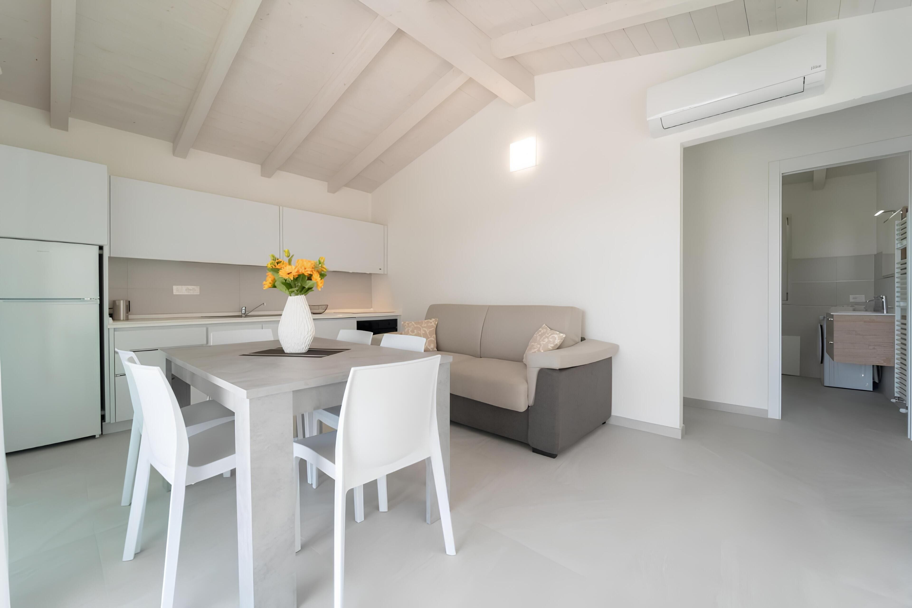 Panoramic-Penthouse, Meerblick | Wohnbereich | Flachbildfernseher