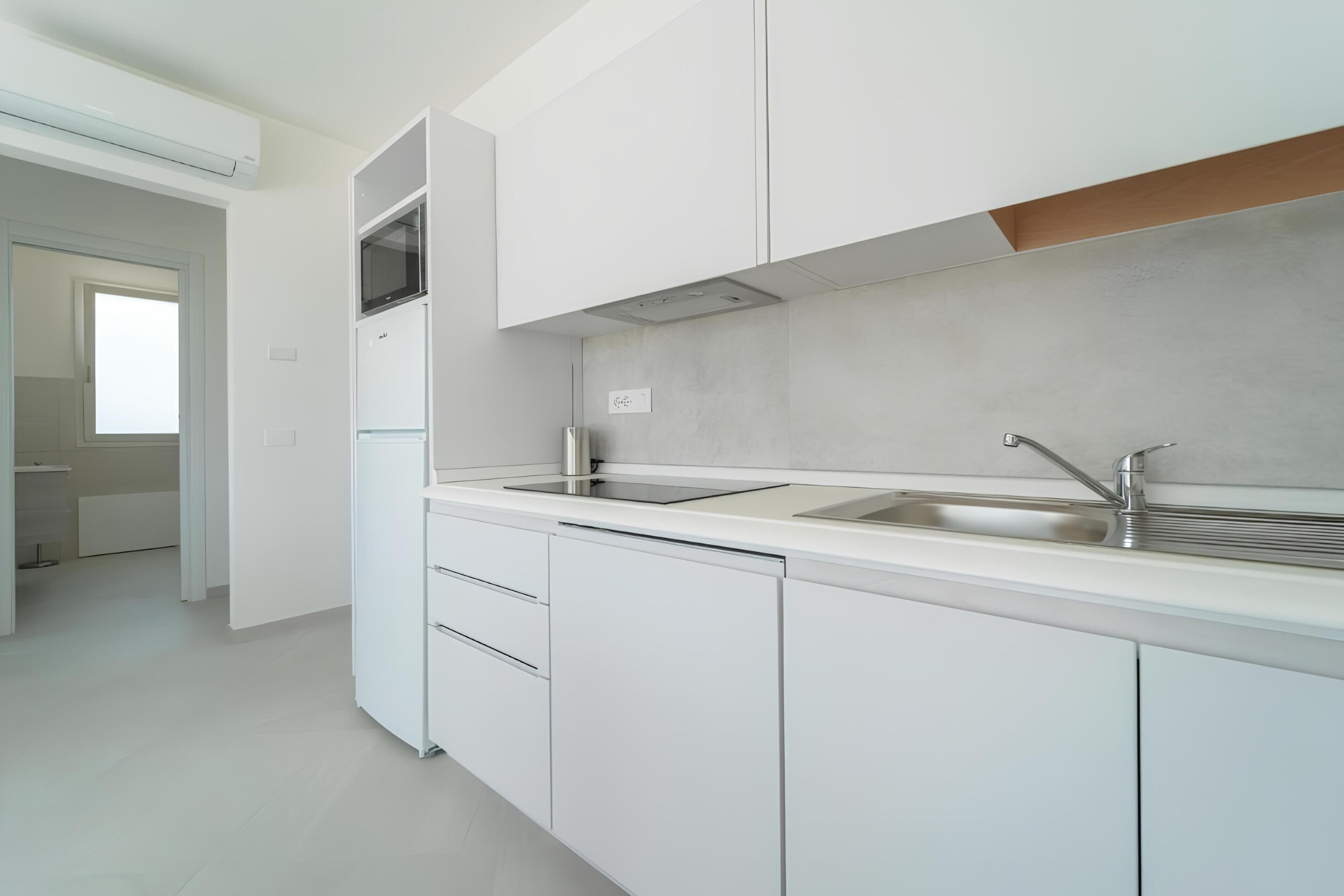 Premier-Apartment, Blick auf den Innenhof | Eigene Küche