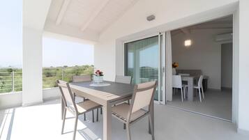Panoramic Penthouse, Sea View | Outdoor dining