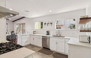 Fridge, microwave, oven, stovetop - Sunny Ocean Beach House 3BR & Patio Walk to Beach (San Diego)