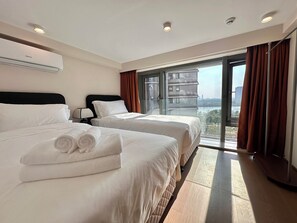 Deluxe Loft, 3 Bedrooms, Kitchen, Garden Area | In-room safe, desk, laptop workspace, blackout drapes - Mi Casa Service Apartment (Guangzhou)