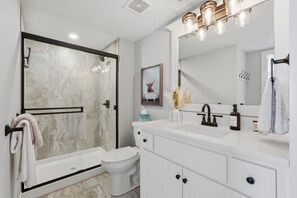 Bathroom - Welcome to your luxury Lee’s Summit getaway—a high-end 4-bedroom, 3-bath home designed for comfortable group stays with a true “vacation mode” backyard. (Lees Summit)