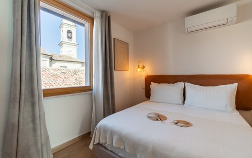 Chambre d’hôtes « Residenza Tre Cuori » avec vue sur le lac, Wi-Fi et climatisation