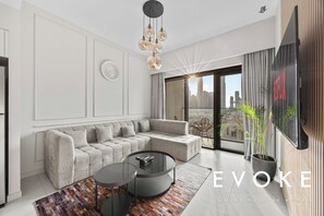 Living area - Luxury Burj Royale 2BR Burj Khalifa & Fountain View With Balcony by Evoke (Dubai)