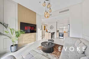 Living area - Luxury Burj Royale 2BR Burj Khalifa & Fountain View With Balcony by Evoke (Dubai)