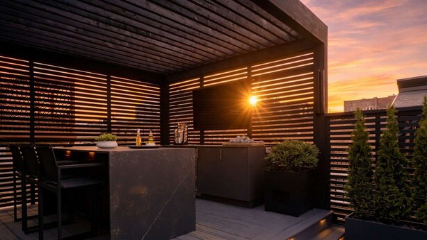 An outdoor patio with a wooden deck, a bar area, and a seating arrangement. - RoofTopPatio–HotTub–FirePit-WetBar-Downtown (Cleveland)