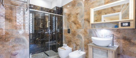 Superior Quadruple Room | Bathroom | Shower, hair dryer, towels, soap