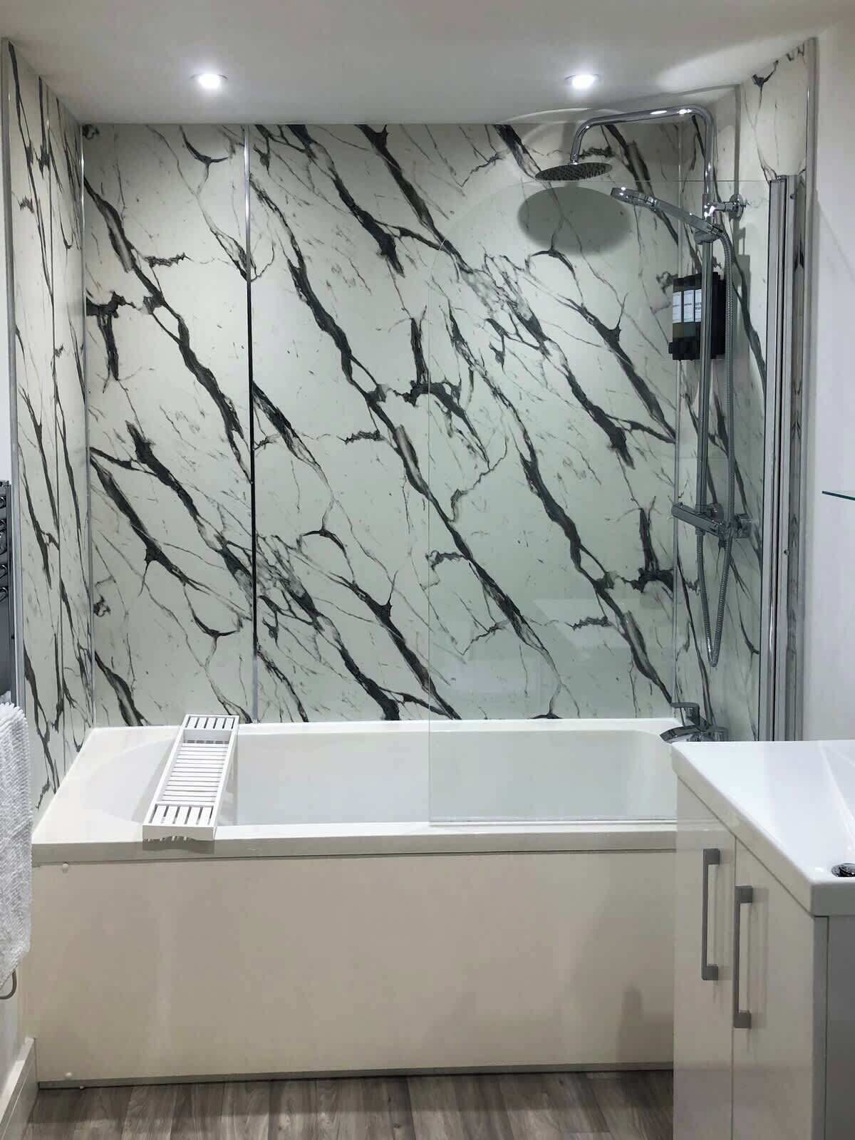 Shower, hair dryer, towels, shampoo