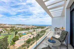 Outdoor dining - LAURA- Modern apartment with golf and sea views (La Cala de Mijas)