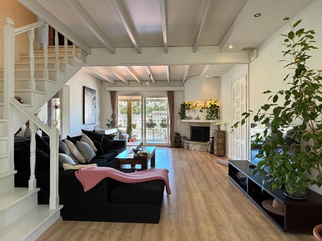 Departamento, vista al mar | Área de sala de estar