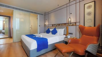 Deluxe Double or Twin Room | Minibar, in-room safe, iron/ironing board, rollaway beds