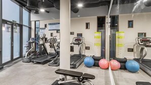 A gym with treadmills, elliptical machines, and exercise balls. - Student Only Bronze Ensuite at Highbury  (London)