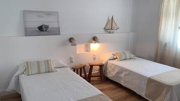 3 dormitorios, tabla de planchar con plancha, wifi y ropa de cama