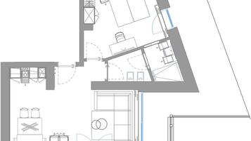 A floor plan with a kitchen, dining area, and two bedrooms.