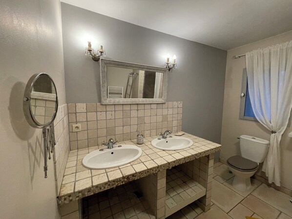 Shower, towels, toilet paper
