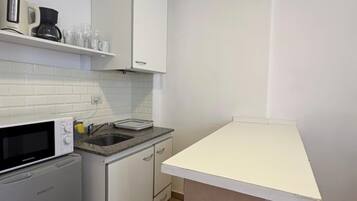 Apartamento, 3 camas individuales | Cocina privada