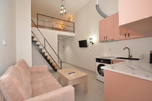 Luxury Apartment | Living room | 75-cm flat-screen TV with digital channels - Seva Apart-Hotel (Yerevan)