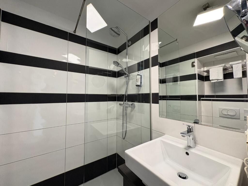 Shower, free toiletries, hair dryer, towels