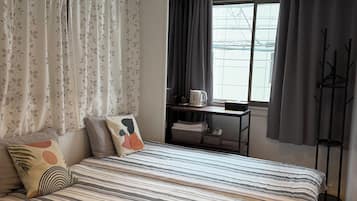 Blackout curtains, iron/ironing board, free WiFi
