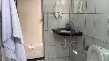 Shower, towels, soap, toilet paper