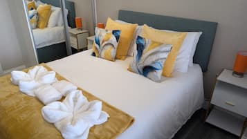 2 habitaciones, tabla de planchar con plancha, wifi y ropa de cama