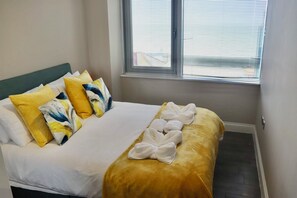 2 habitaciones, tabla de planchar con plancha, wifi y ropa de cama