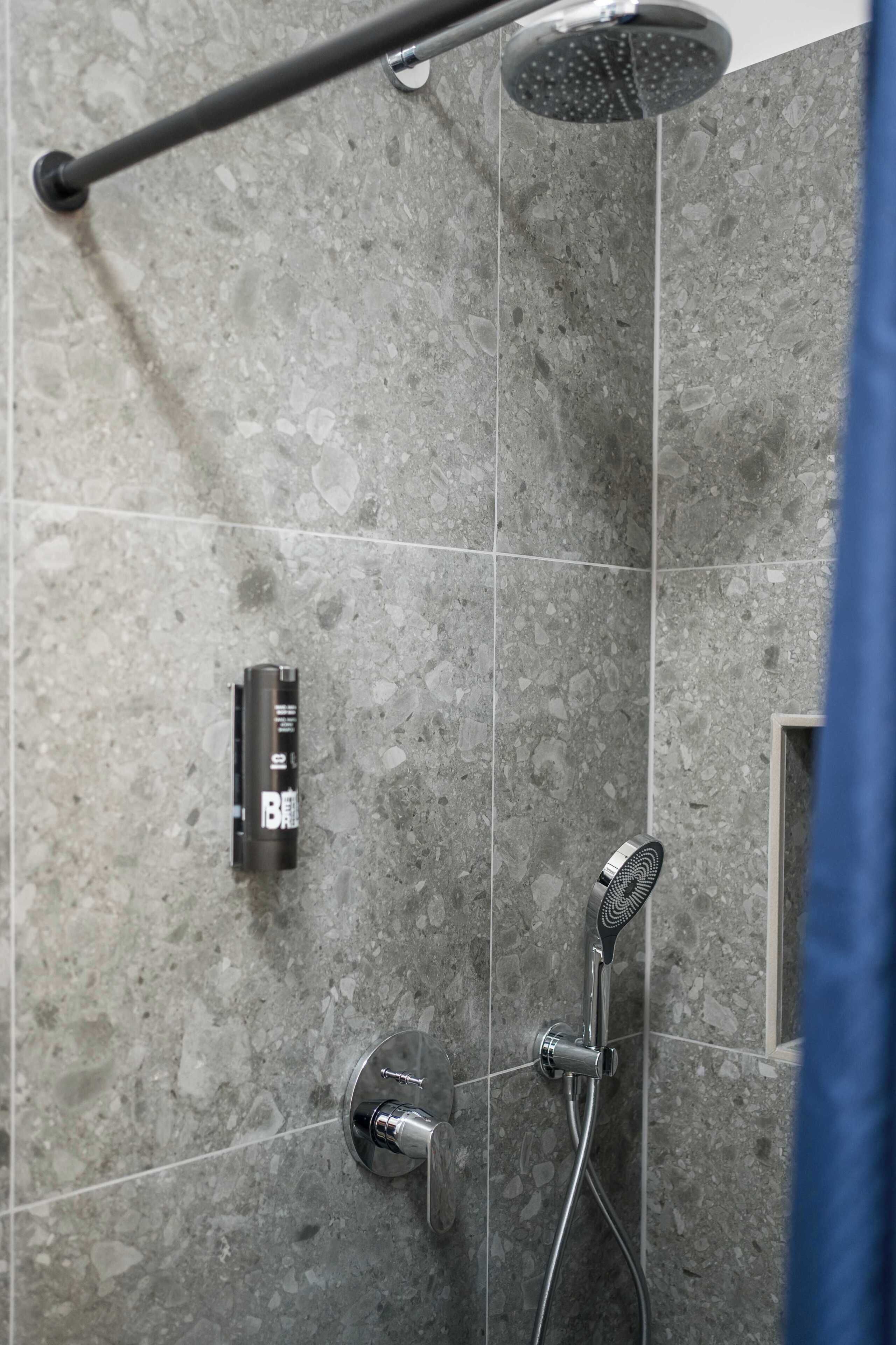 Shower, hair dryer, towels, shampoo
