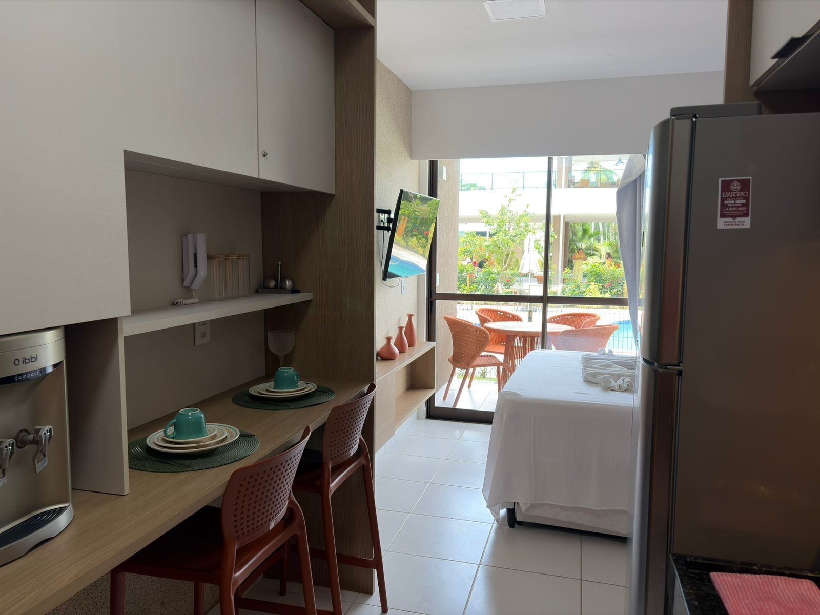 Apartamento luxo, vista para a piscina, no piso térreo