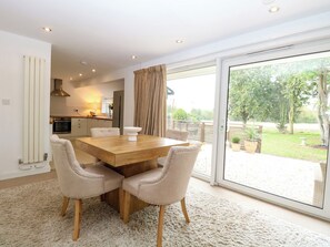 A modern kitchen with a dining area. - Three Ways (Diss)