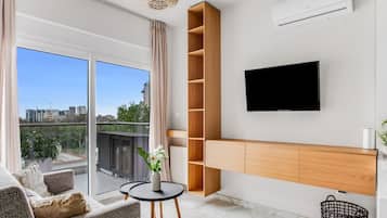 Apartemen, 1 kamar tidur, balkon | Area keluarga